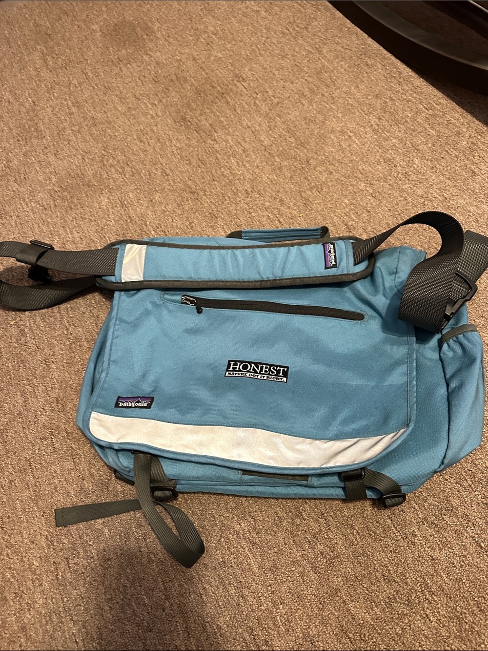 Patagonia Teal Messenger Bag with silver reflective Trim great condition